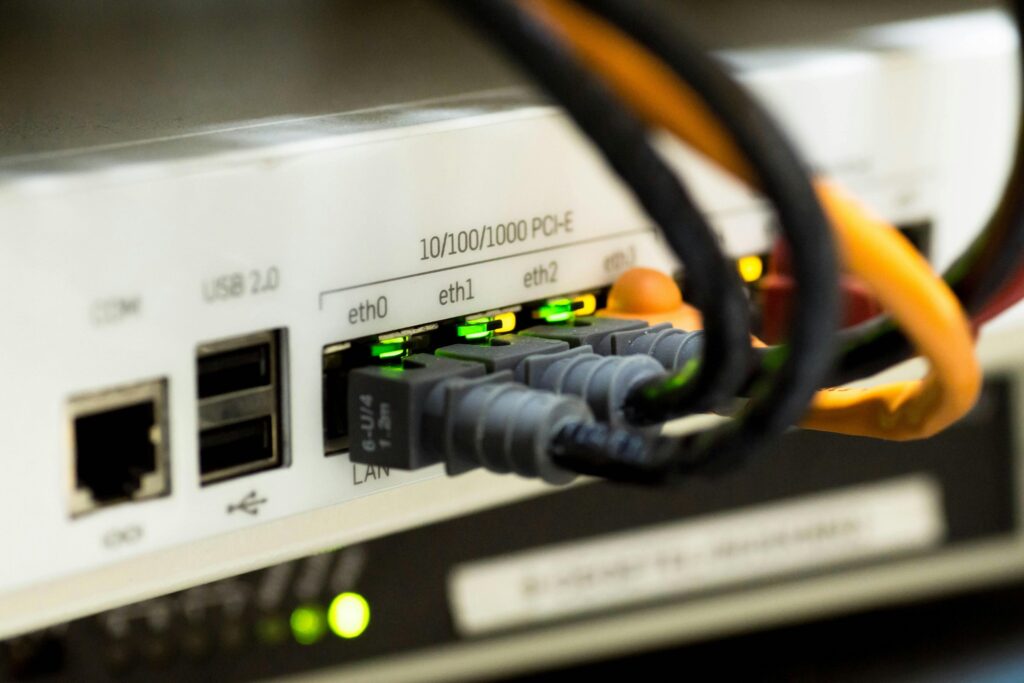 Network router with ethernet cables connected to LAN ports