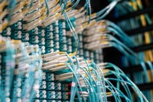 Fibre optic network cables connected to a data centre patch panel.